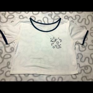 White crop top with design.